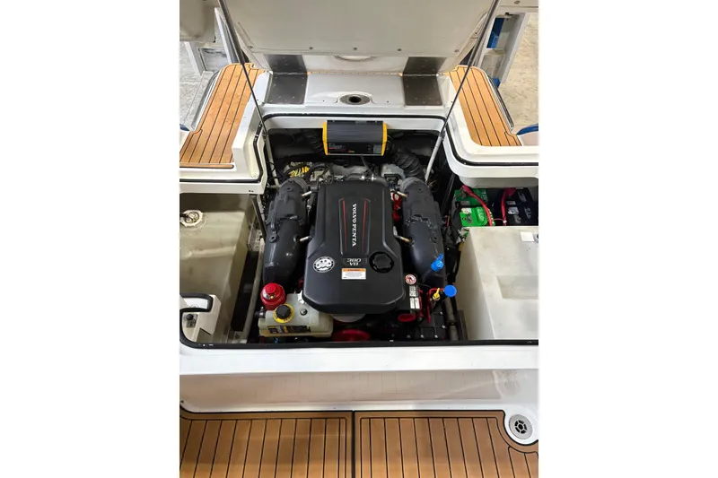 Slide: The Image of 2018 Cobalt R5 Surf boat engine compartment with Volvo Penta engine. - 21