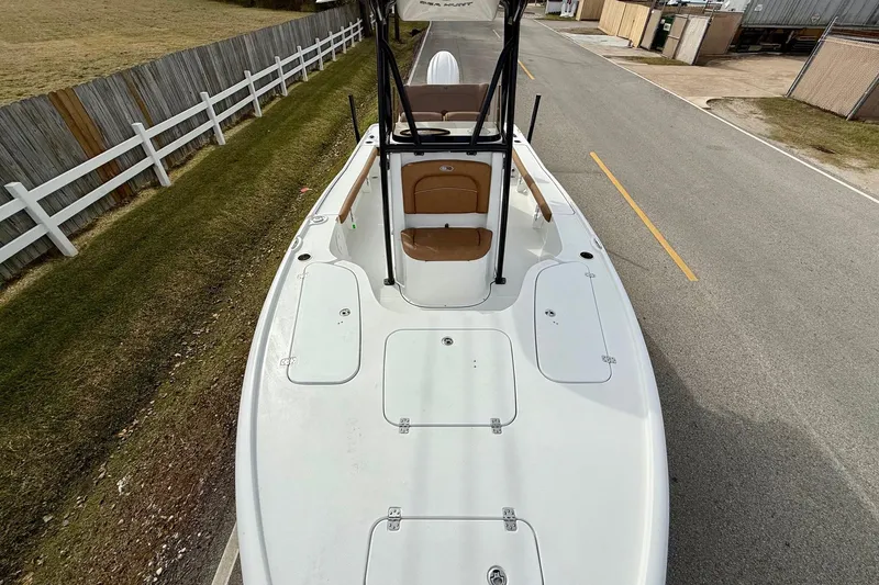 Slide: The Image of 2026 Sea Hunt BX 22 BR boat parked on road. - 17