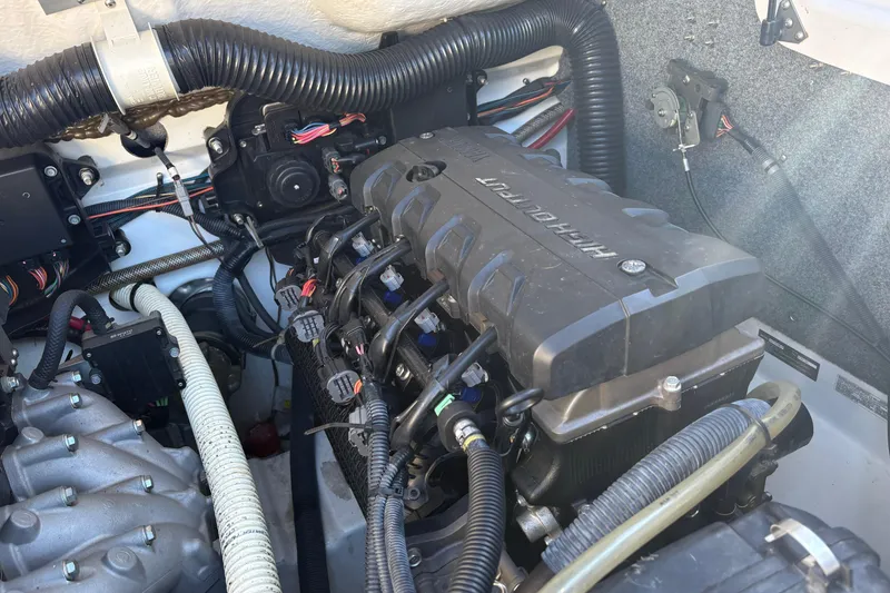 Slide: The Image of Engine compartment of a 2015 Yamaha Boats 212X, showcasing detailed wiring and components. - 20