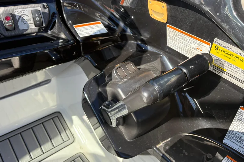 Slide: The Image of Close-up of 2015 Yamaha Boats 212X throttle and control panel. - 30