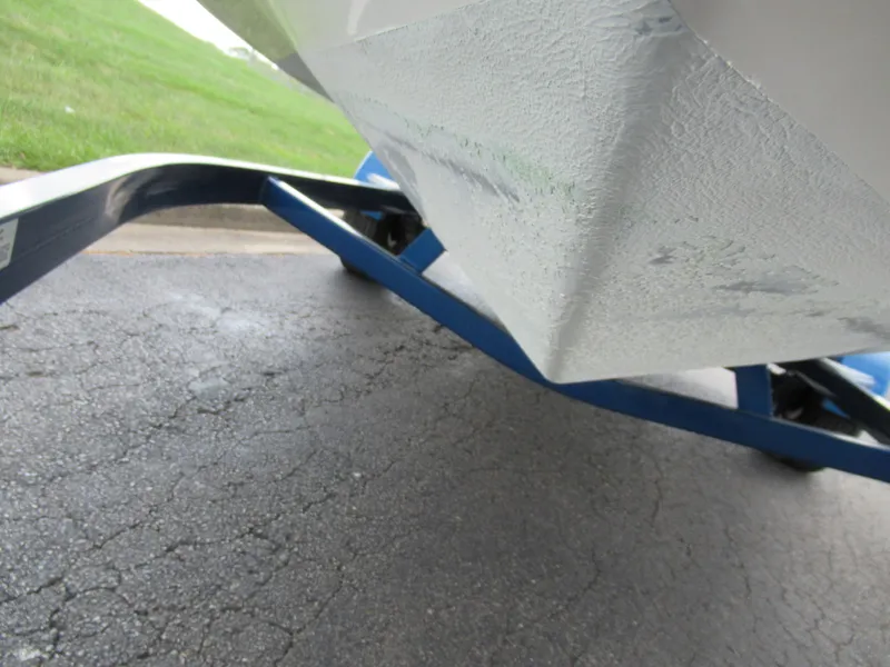 Slide: The Image of 2008 Glastron GXL 185 boat hull on trailer, close-up view. - 7