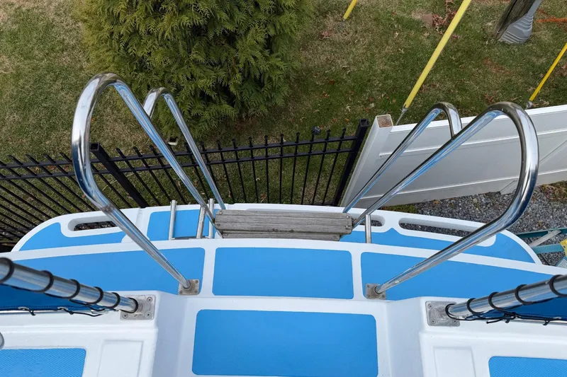 Slide: The Image of Stainless steel ladder on 1984 Golden Star 38 Trawler, viewed from above. - 13