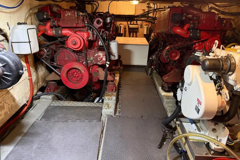 Slide: The Image of Engine room of 1984 Golden Star 38 Trawler with red machinery and equipment. - 45