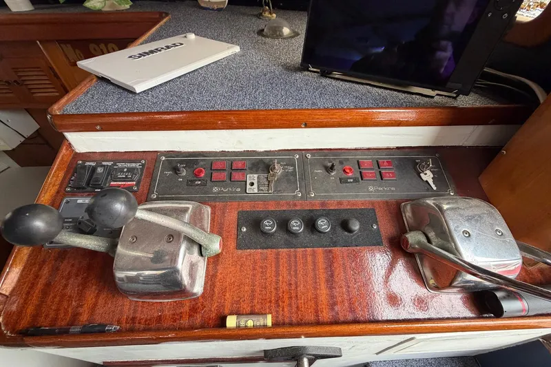 Slide: The Image of Control panel of a 1984 Golden Star 38 Trawler with navigation equipment. - 50