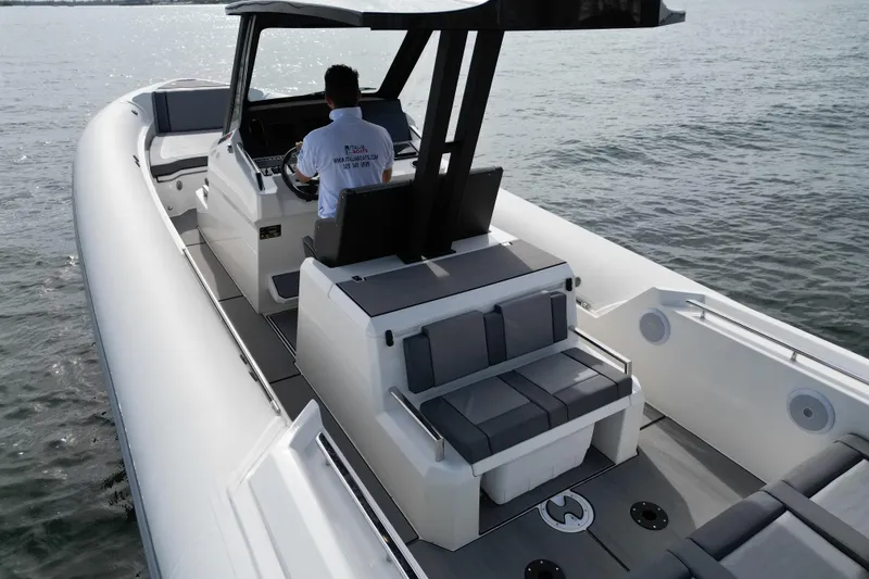 Slide: The Image of 2026 Northstar ORION 10 boat on water, featuring sleek design and modern seating. - 10