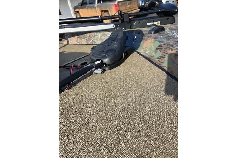 Slide: The Image of 2026 G3 Sportsman 1710 PFX Camo boat with Minn Kota trolling motor. - 4