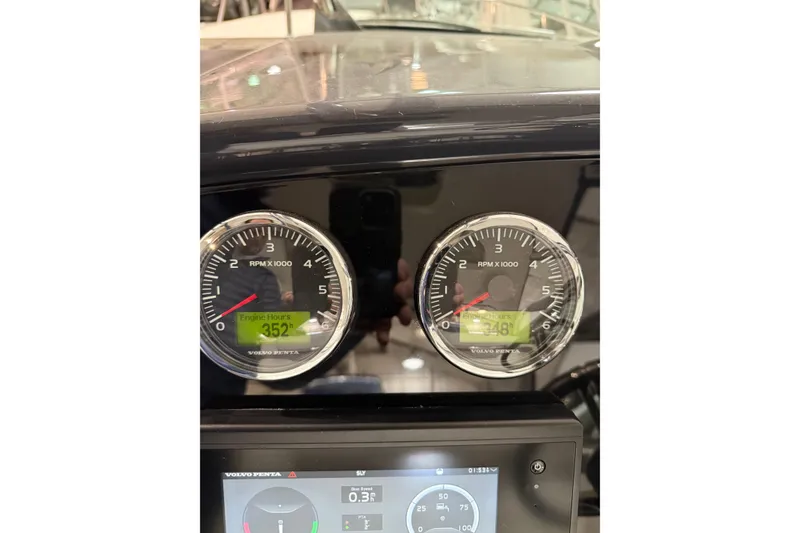 Slide: The Image of Dashboard of 2018 Formula 400 Super Sport showing RPM and engine hours. - 23