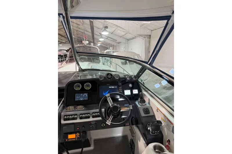 Slide: The Image of Interior view of 2018 Formula 400 Super Sport boat cockpit with modern controls. - 24