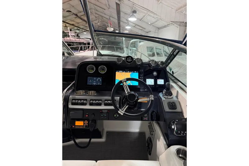 Slide: The Image of 2018 Formula 400 Super Sport boat dashboard with advanced navigation controls. - 25