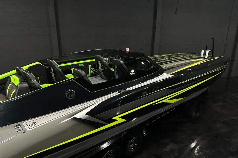 Slide: The Image of 2025 Mystic Powerboats C4000 Rear Side View - 2