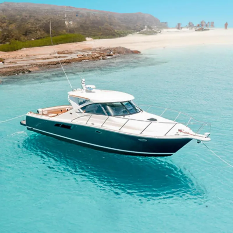 The Image of 2013 Tiara Yachts 3600 Coronet in clear turquoise waters. - 0