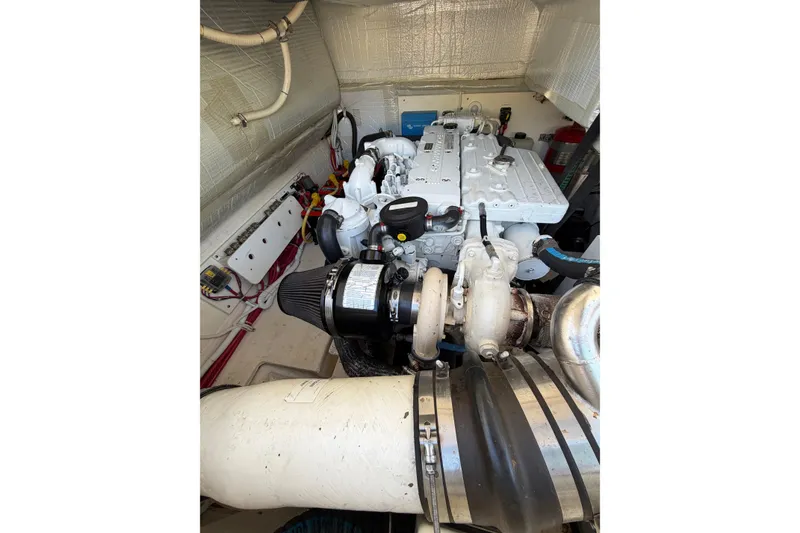 Slide: The Image of Engine room of 2013 Tiara Yachts 3600 Coronet, showcasing detailed mechanical components. - 20