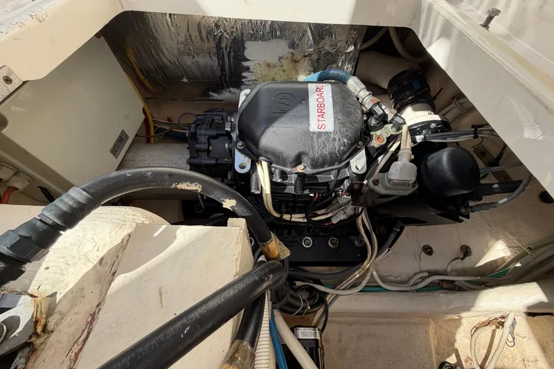 Slide: The Image of Engine compartment of a 2013 Tiara Yachts 3600 Coronet, showing detailed mechanical components. - 23