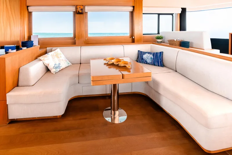 Slide: The Image of Luxurious interior of 2023 Sirena 58 yacht with elegant seating and ocean view. - 17