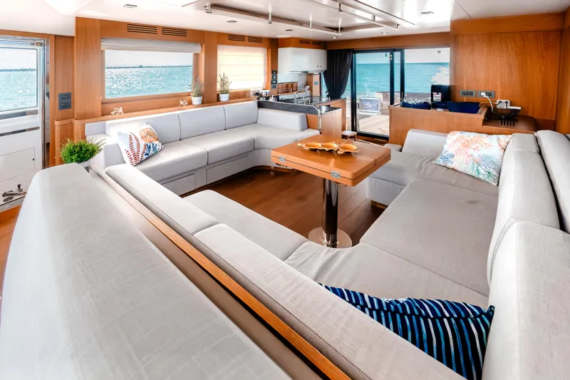 Slide: The Image of Luxurious interior of 2023 Sirena 58 yacht with spacious seating and ocean view. - 19