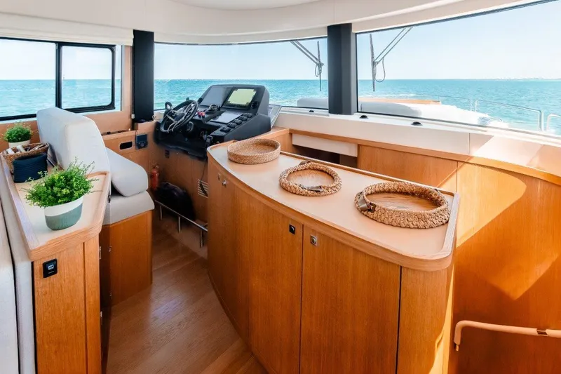 Slide: The Image of Luxurious interior of 2023 Sirena 58 yacht with modern helm and ocean view. - 21