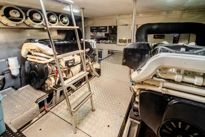 Slide: The Image of Engine room of 2023 Sirena 58 yacht with ladder and machinery. - 30