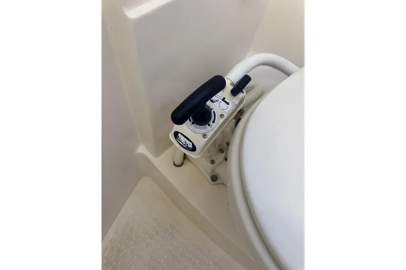 Slide: The Image of Marine toilet control panel on 1994 Catalina Morgan 38 sailboat. - 17