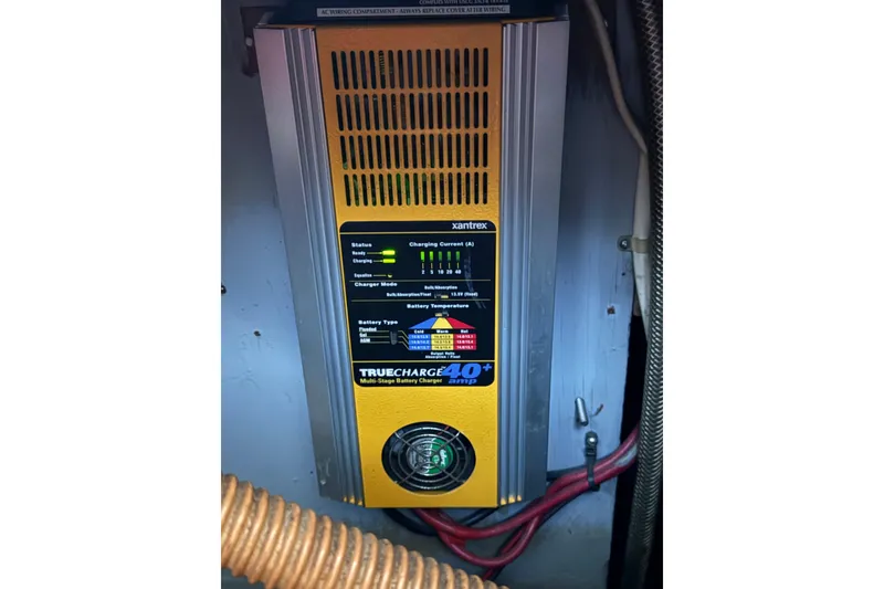 Slide: The Image of 1985 Niagara Encore battery charger, Xantrex TrueCharge 40+, multi-stage charging system. - 29