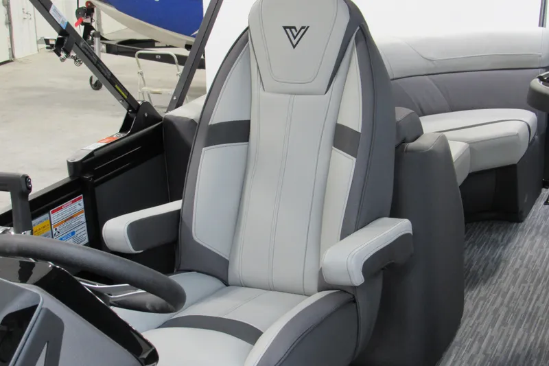 Slide: The Image of 2026 Viaggio Lago X22U boat interior with modern captain's chair and sleek design. - 11