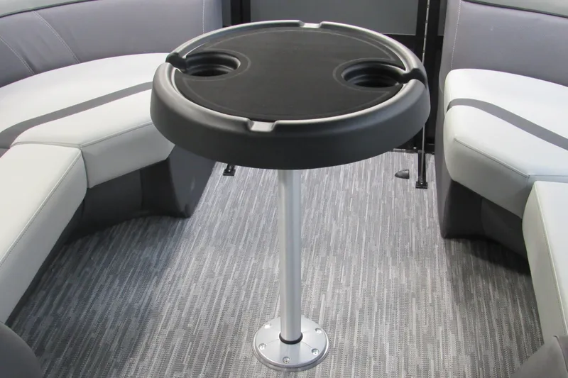 Slide: The Image of Interior of 2026 Viaggio Lago X22U boat with round table and seating. - 3