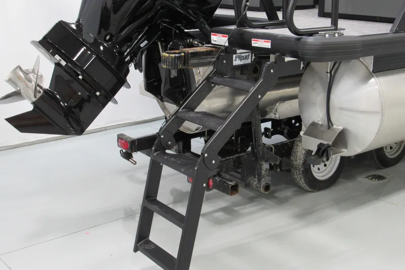 Slide: The Image of 2026 Viaggio Lago X22U boat with ladder and motor, showcasing rear design and features. - 7