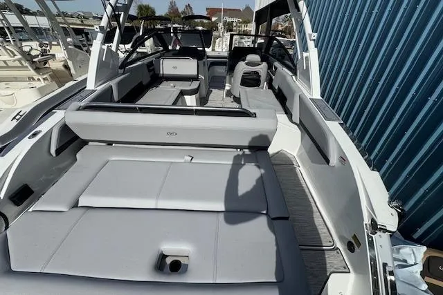 Slide: The Image of 2026 Cobalt R6 boat interior with sleek gray seating and modern design. - 14
