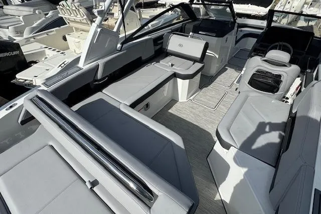 Slide: The Image of 2026 Cobalt R6 boat interior with sleek gray seating and modern design. - 15