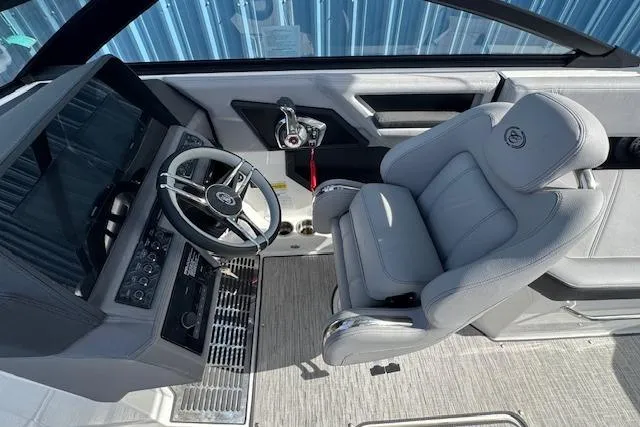 Slide: The Image of 2026 Cobalt R6 boat interior with modern steering and luxurious seating. - 18