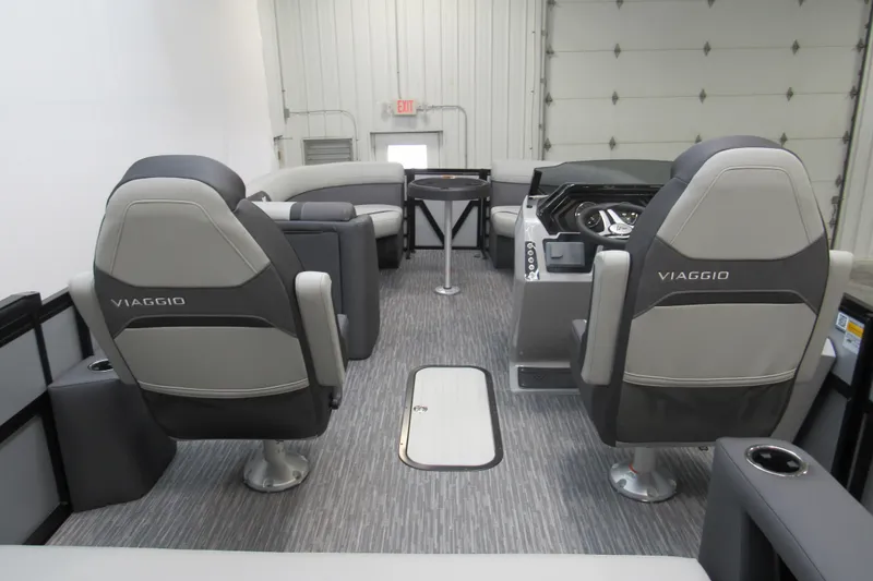 Slide: The Image of Interior of 2026 Viaggio Lago X22S boat with modern seating and steering console. - 3