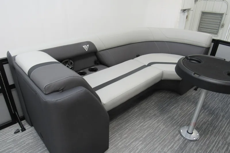 Slide: The Image of Luxurious seating area in 2026 Viaggio Lago X22S boat with modern design and cup holders. - 6