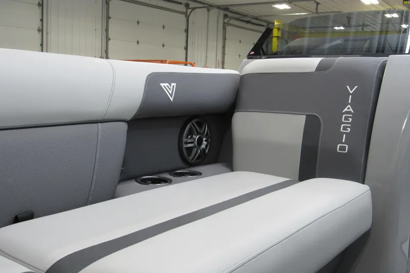 Slide: The Image of Luxurious interior of 2026 Viaggio Lago X22S with sleek seating and integrated speakers. - 9