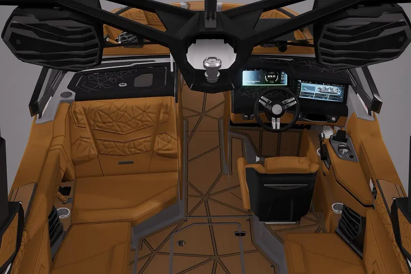 Slide: The Image of 2026 Nautique Super Air Nautique G23 Paragon interior with luxurious tan seating and advanced dashboard. - 4