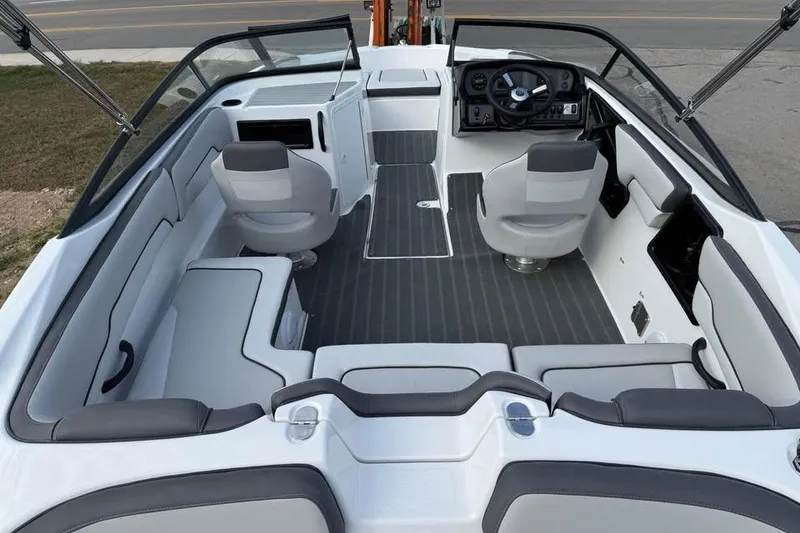 Slide: The Image of 2026 Yamaha Boats SX190 interior with sleek seating and modern dashboard design. - 6