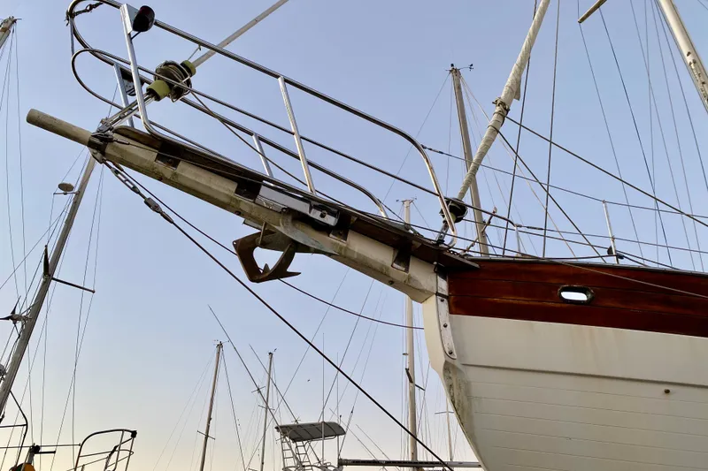 Slide: The Image of Sailboat bow of 1991 Hans Christian 41 T Molakai with anchor and rigging. - 10