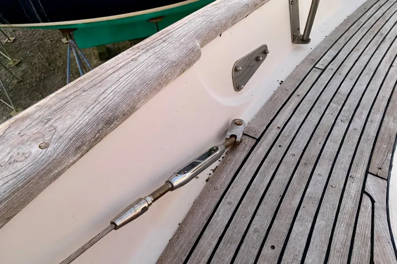 Slide: The Image of Deck of 1991 Hans Christian 41 T Molakai sailboat with wooden finish and metal fittings. - 113