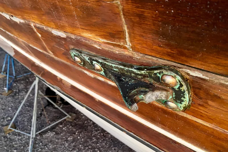 Slide: The Image of Close-up of 1991 Hans Christian 41 T Molakai boat hull with metal fitting. - 114