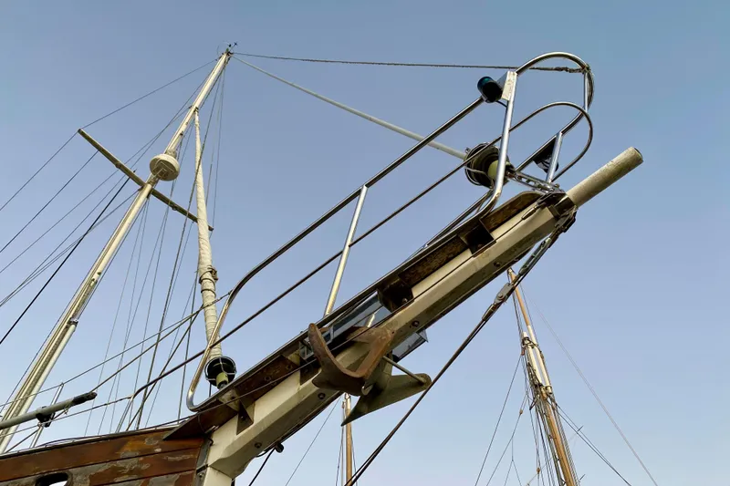 Slide: The Image of Sailboat mast and rigging of 1991 Hans Christian 41 T Molakai against clear sky. - 12