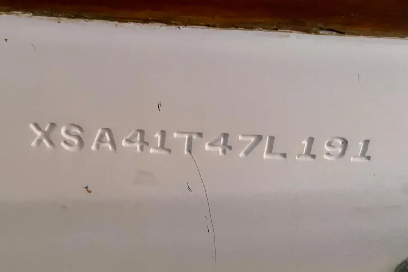 Slide: The Image of Hull identification number on a 1991 Hans Christian 41 T Molakai boat. - 121