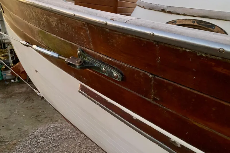 Slide: The Image of Close-up of 1991 Hans Christian 41 T Molakai boat's wooden hull detail. - 126