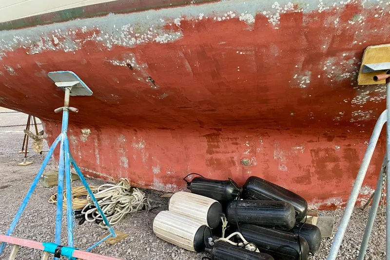 Slide: The Image of Bottom view of 1991 Hans Christian 41 T Molakai sailboat on stands with fenders. - 19