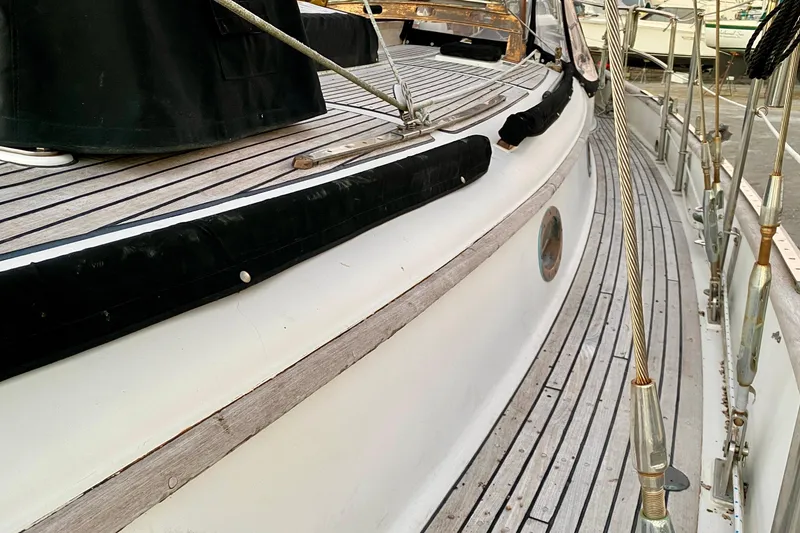 Slide: The Image of Deck of 1991 Hans Christian 41 T Molakai sailboat with wooden finish and rigging details. - 35