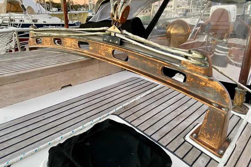 Slide: The Image of Deck detail of 1991 Hans Christian 41 T Molakai sailboat with wooden and metal elements. - 43