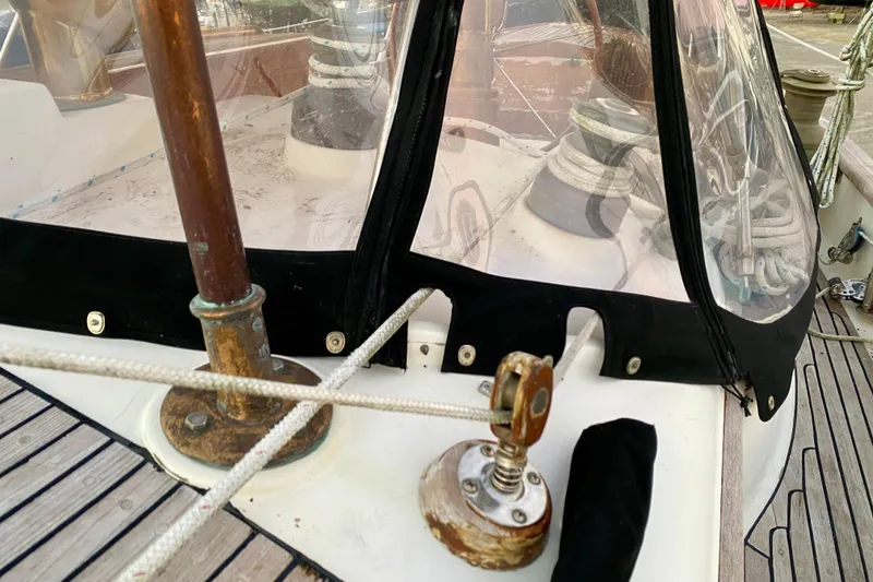 Slide: The Image of Close-up of 1991 Hans Christian 41 T Molakai sailboat deck with ropes and fittings. - 44