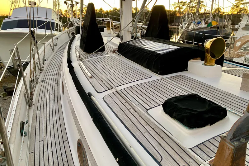 Slide: The Image of Sailboat deck of 1991 Hans Christian 41 T Molakai at sunset in marina. - 45