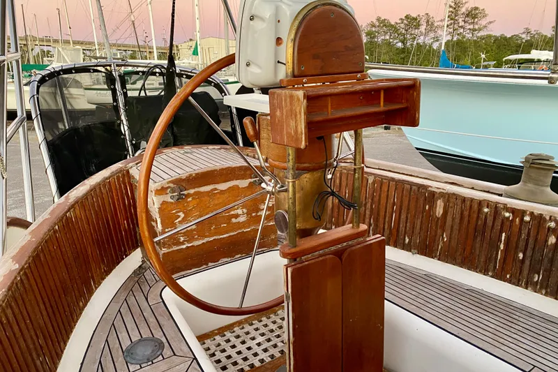 Slide: The Image of Cockpit of 1991 Hans Christian 41 T Molakai sailboat with wooden steering wheel. - 54