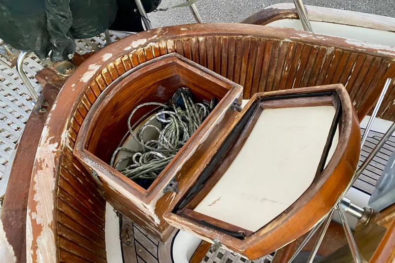 Slide: The Image of Open wooden storage compartment on 1991 Hans Christian 41 T Molakai sailboat deck. - 63