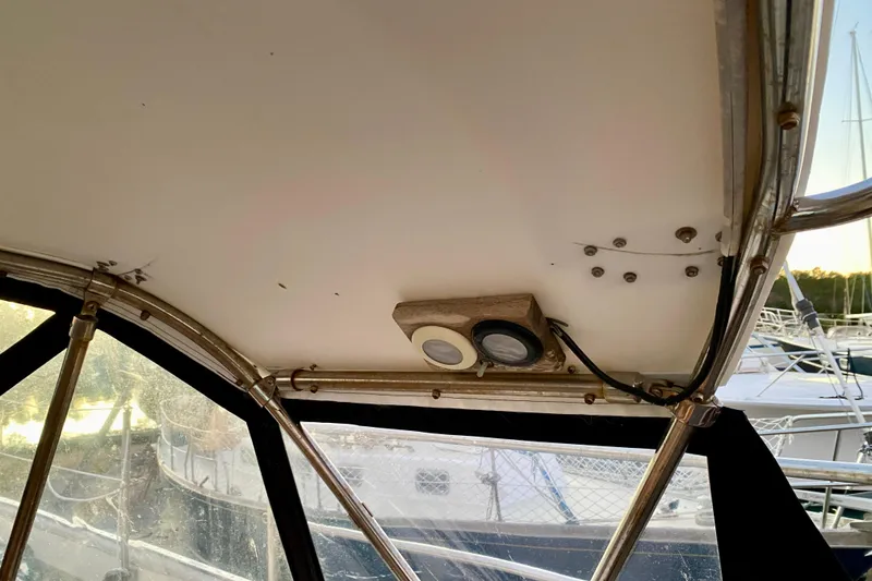 Slide: The Image of Interior view of 1991 Hans Christian 41 T Molakai sailboat with visible ceiling fixtures. - 70