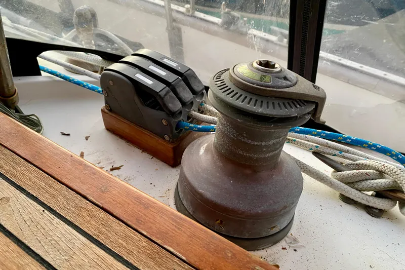 Slide: The Image of Deck equipment on 1991 Hans Christian 41 T Molakai sailboat, featuring winch and rope clutches. - 72