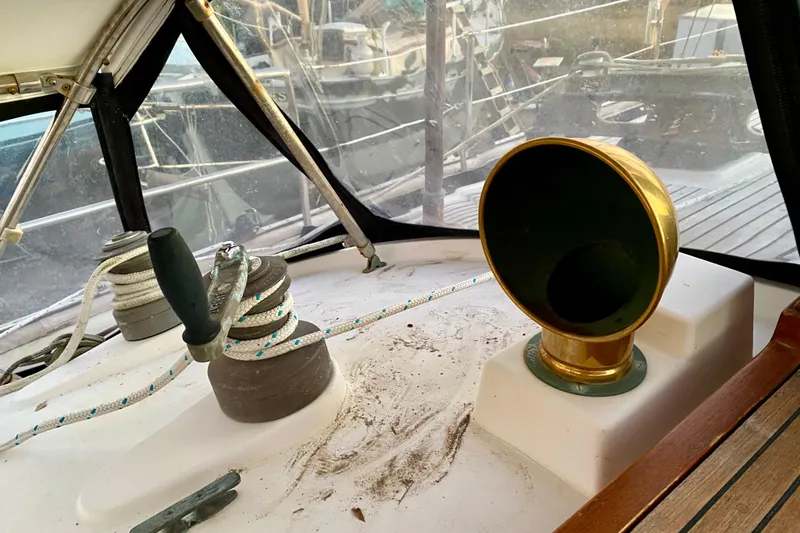 Slide: The Image of Cockpit of 1991 Hans Christian 41 T Molakai sailboat with winch and brass vent. - 73